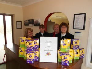 Le Roy Funerals staff with Easter eggs